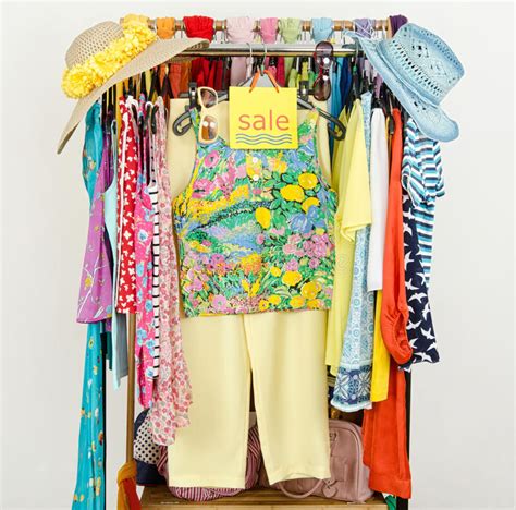 Rack With Summer Clothes And Sale Sign. Stock Photo - Image: 41821096