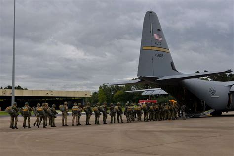 Paratroopers from multiple countries load a C-130J - NARA & DVIDS Public Domain Archive Public ...