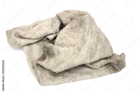 Cloth rag with stains on white background. Stock Photo | Adobe Stock