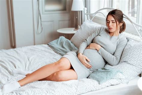 Beautiful, Pregnant Woman Experiencing Belly Pain Stock Photo - Image of prenatal, preparation ...