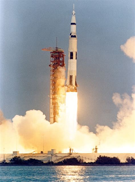 Apollo 13 yaws away from the launch tower during lift-off : space