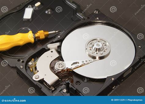 Open hard drive for repair stock image. Image of writing - 30911229