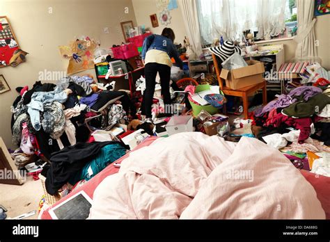 Teenage Girl In Her Messy Bedroom England Stock Photo - Alamy