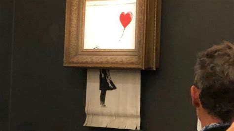 Banksy Painting Self-Destructs Seconds After Being Sold for $1.4 Million at Auction