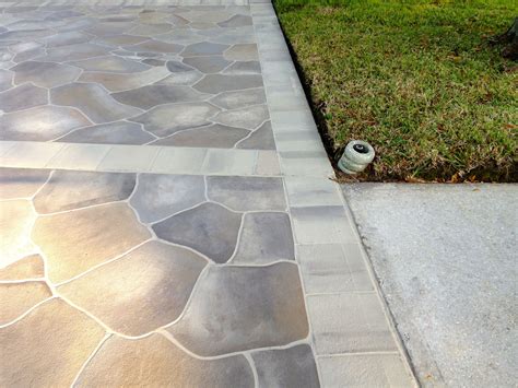 driveway staining | Stained concrete driveway, Brick decor, Stained concrete