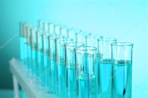 Test-tubes on blue background Stock Photo by ©belchonock 6799288