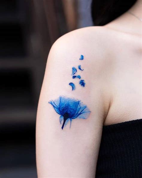 Blue flower tattoo ideas photos