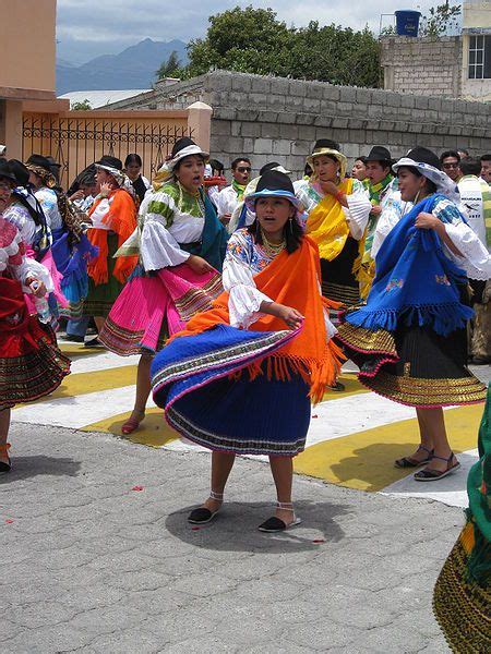 Dancers in Cotacachi, Ecuador. Cotacachi is an artisan city that is famous for its leather goods ...