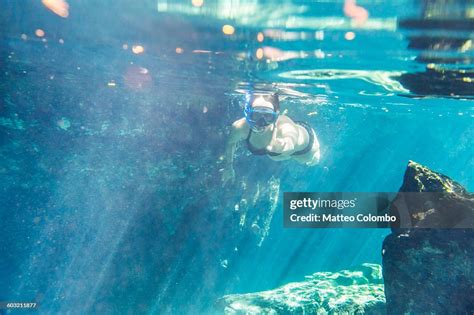 Woman Snorkeling In A Cenote Mexico High-Res Stock Photo - Getty Images