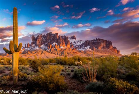 Desert Mountains with Snow | Superstition mountains arizona, Monument valley arizona, Desert sunset