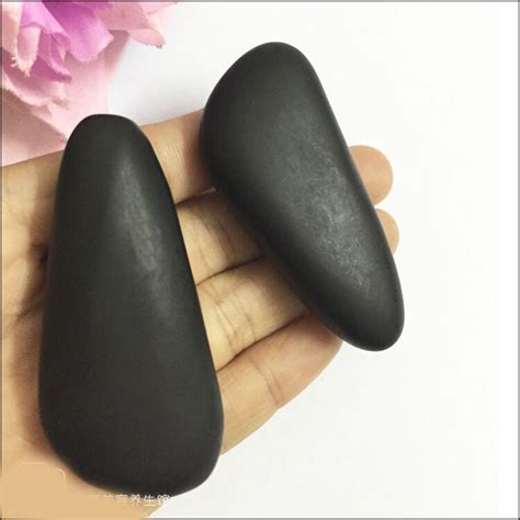 Quality 2 pcs natural volcanic energy massage stone spa stone for face ...