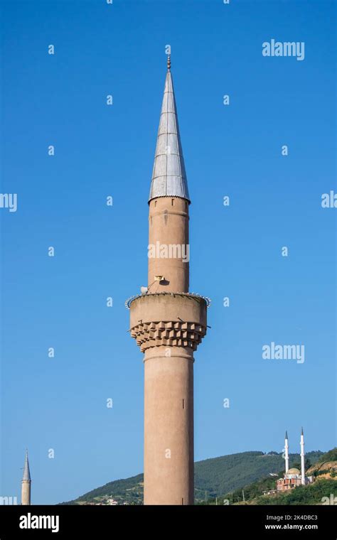 The minaret tower of a Muslim mosque in the city of Prizren, Kosovo ...