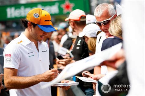 Carlos Sainz Jr., McLaren signs a autograph for a fan at Monaco GP High ...