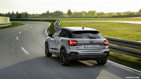 2021 Audi Q2 (Color: Arrow Gray) - Rear Three-Quarter | Caricos