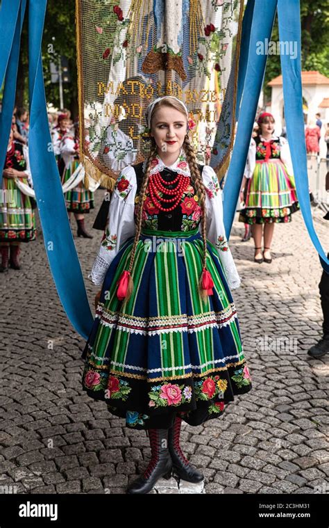 Lowicz, Jun 11, 2020: Girl dressed in polish national folk costume from Lowicz region during ...