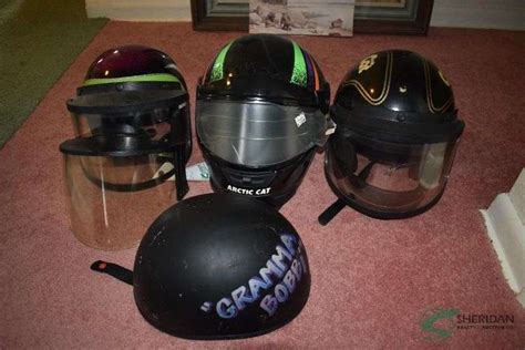 Vintage snowmobile helmets - Sheridan Realty & Auction Co.