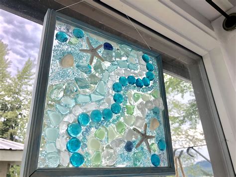 Window sea glass and marble mosaic | Glass window art, Sea glass window art, Sea glass window