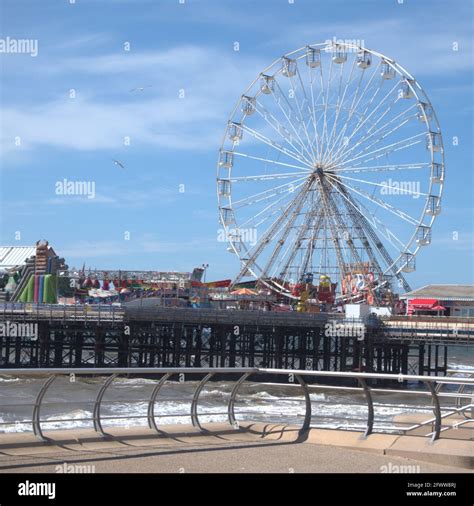 Central pier Blackpool featuring the Ferris wheel Stock Photo - Alamy