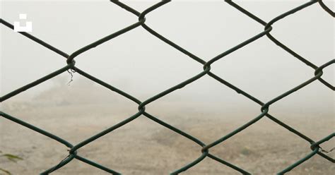 Gray cyclone fence on focus photography photo – Free Rail Image on Unsplash