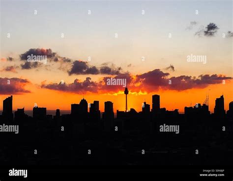 Sydney skyline at sunset Stock Photo - Alamy