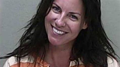 Florida Woman Smiles In Mugshot After Causing Deadly DUI Crash, Police Say