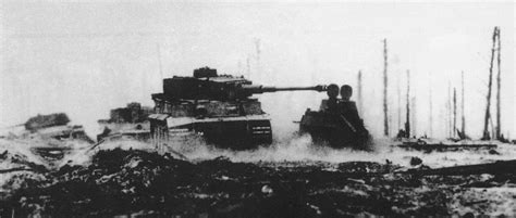 Tiger tanks advance past knocked out Soviet T-34's at Kursk, 1943. : wwiipics