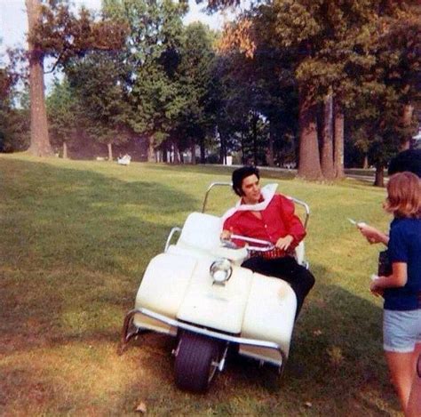 Elvis having fun in his golf cart and greeting fans at Graceland ...