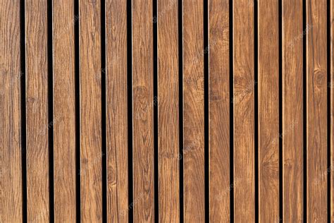 Premium Photo | Brown plank wood wall background