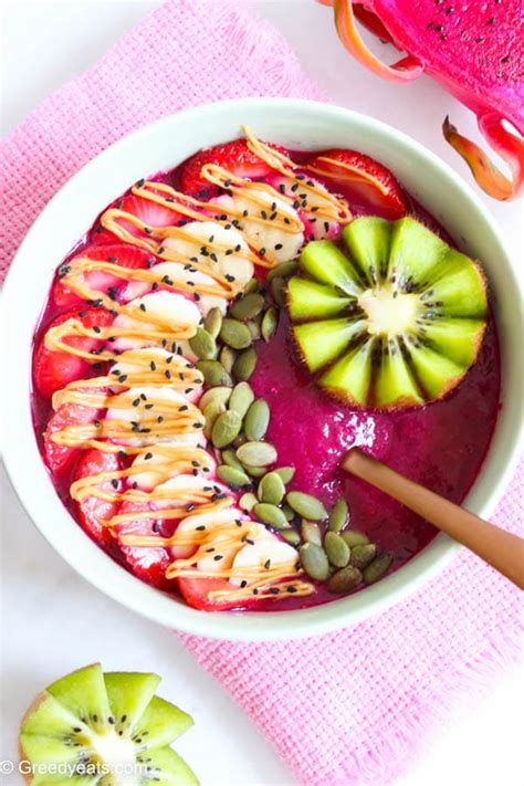 Dragon fruit smoothie bowl with kiwi, strawberry and seeds