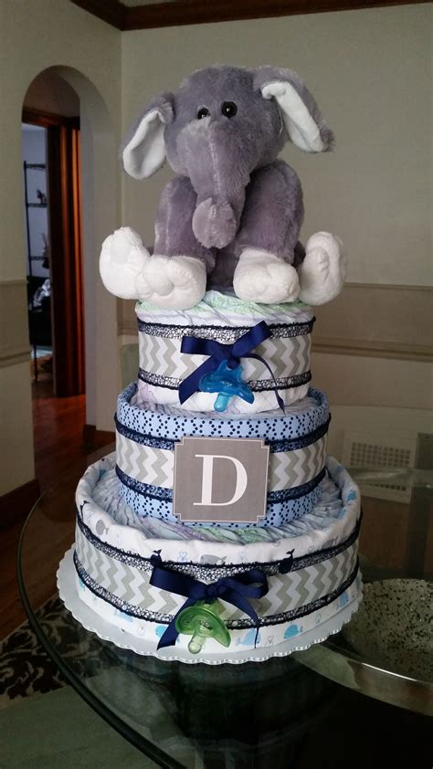 Baby boy diaper cake made with receiving blankets and ribbon. | Baby ...