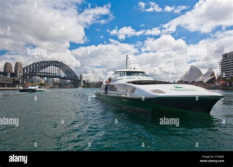 Catamaran ferry in Sydney Harbour with bridge and opera house Stock Photo - Alamy