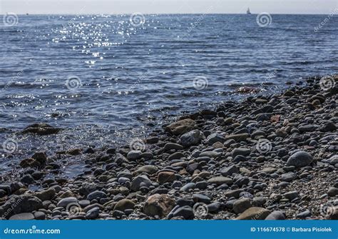 Llanbedrog, Wales, the UK - Pebbles and Blue Waters. Stock Photo - Image of countryside, cute ...