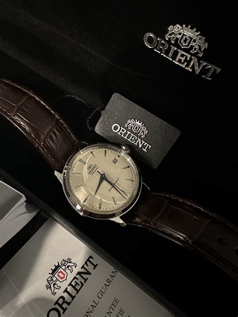 [WTS] Orient Bambino 38mm cream dial w/ blue hands : r/Watchexchange