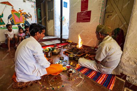 Premium Photo | People performing puja hindu ritual india