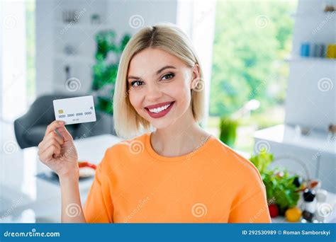 Photo of Positive Girl in Modern Dining Room Hold Credit Card Pay for Food Products in Store ...