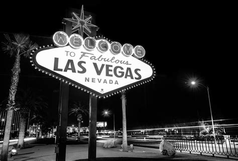 Welcome To Fabulous Las Vegas - Neon Sign In Black And White Photograph by Gregory Ballos