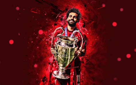 Download Liverpool 4K Salah Holding Trophy Wallpaper | Wallpapers.com