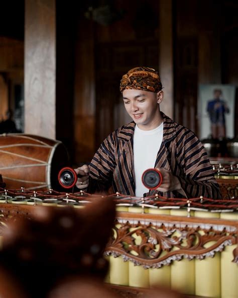 Premium Photo | Portrait of boy sitting on stage - gamelan indonesian ...