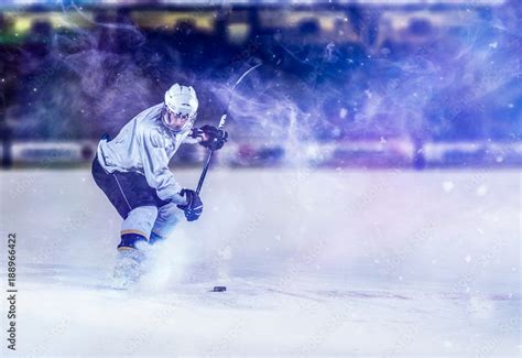 ice hockey player in action Stock Photo | Adobe Stock