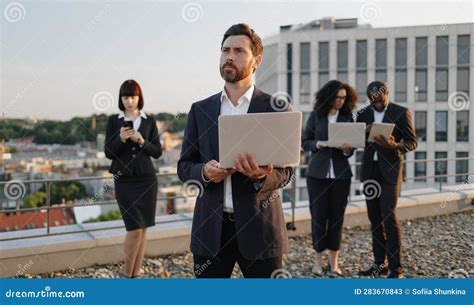 Four Successful Agents Using Portable Devices for Work Stock Image - Image of devices ...