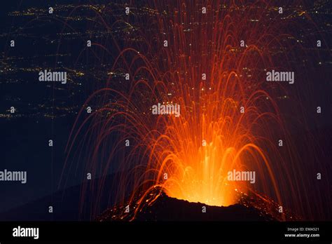 Volcano eruption of night Stock Photo - Alamy