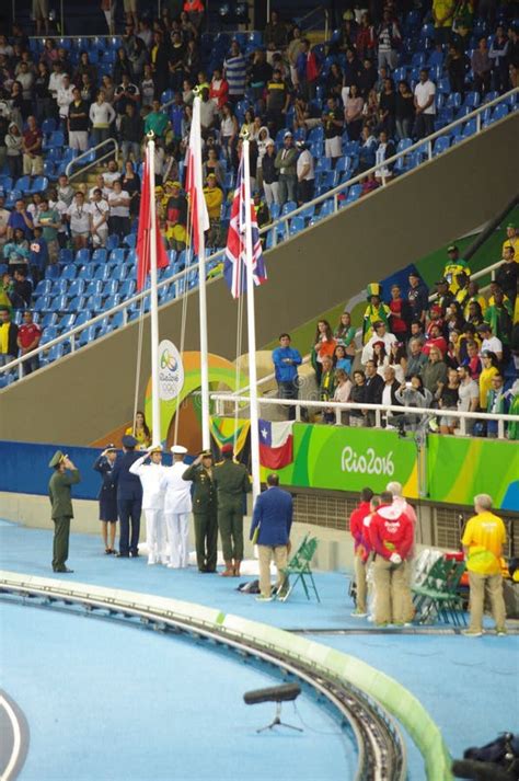 Flags Raising at the Olympics Editorial Stock Image - Image of raising, armed: 76668289