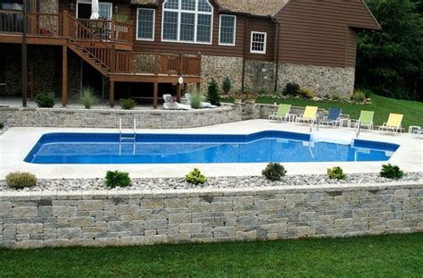 Pin by Terry Love on Pools | Pool patio, Backyard pool landscaping, Sloped backyard