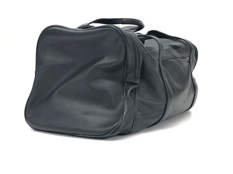 Lot - LEEDS 20IN BLACK LEATHER DUFFEL BAG