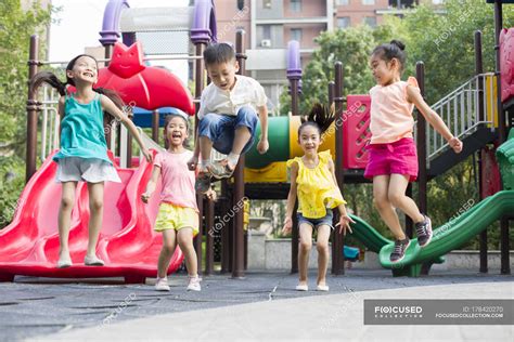 Chinese children playing in amusement park — girls, asian - Stock Photo ...