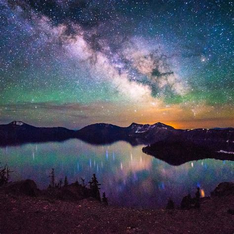 The Milky Way reflected in Crater Lake, Oregon. Crater Lake National ...