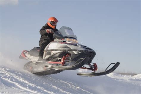 Snowmobile racing stock photo. Image of outdoor, midair - 4477392