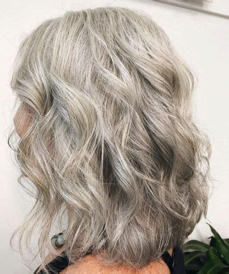 Mid-Length Soft Wavy Gray Hairstyle | Medium hair styles, Gray hair cuts, Long gray hair