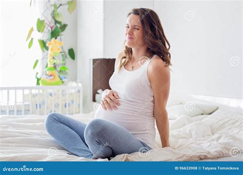 Young Beautiful Pregnant Woman, in Pain with Labor Contraction Stock ...