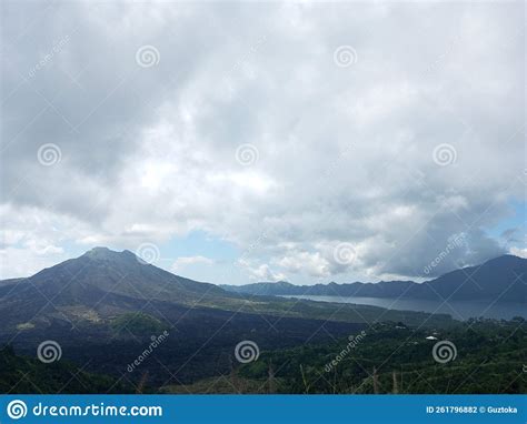 Mount Batur at Day Time with Lake Batur in Side Stock Photo - Image of lake, mountain: 261796882